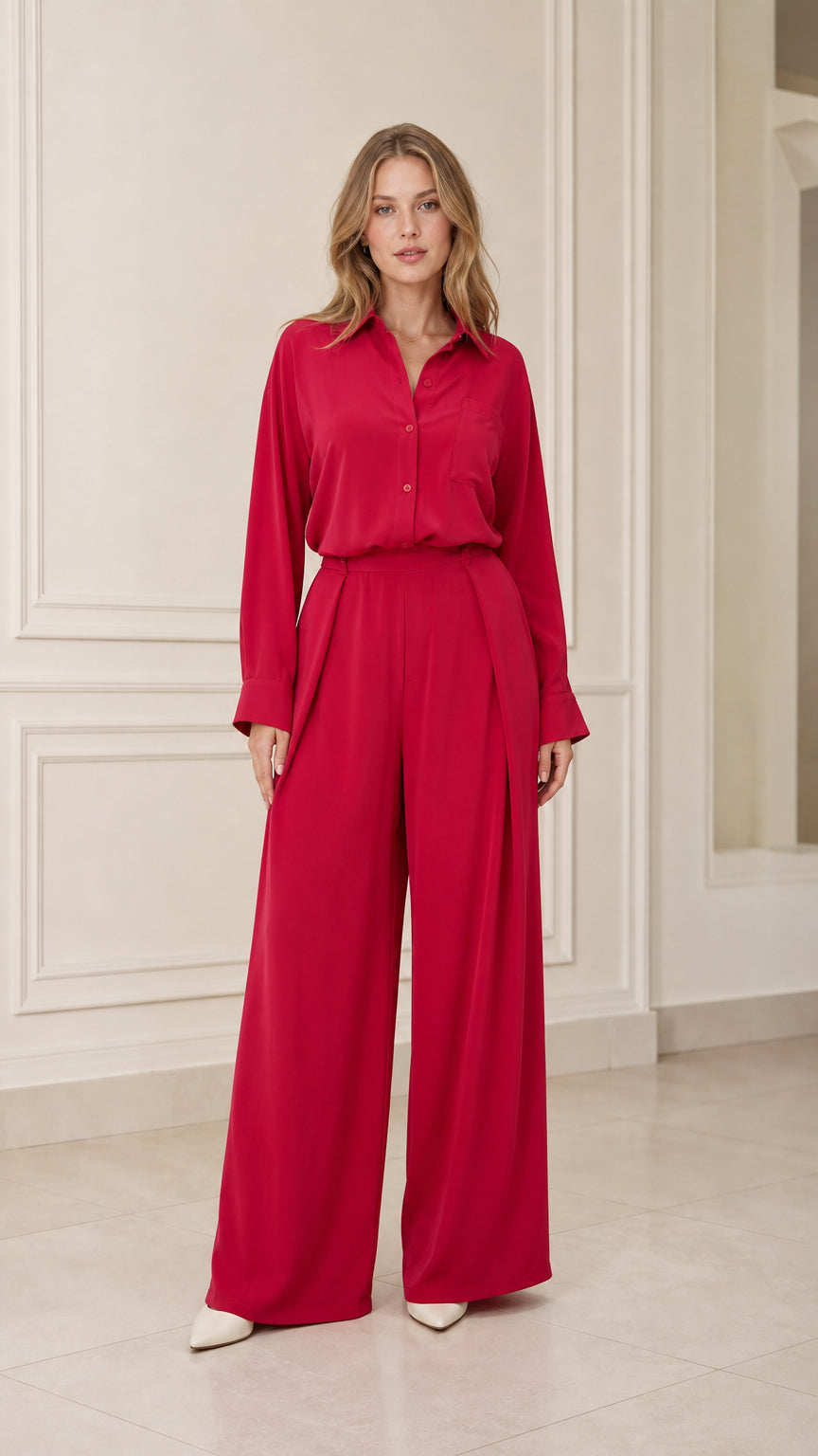 Front view of model wearing red long-sleeve shirt and wide-leg pants set