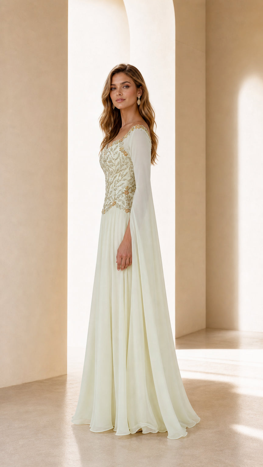Side profile view of ivory evening gown with cape sleeves
