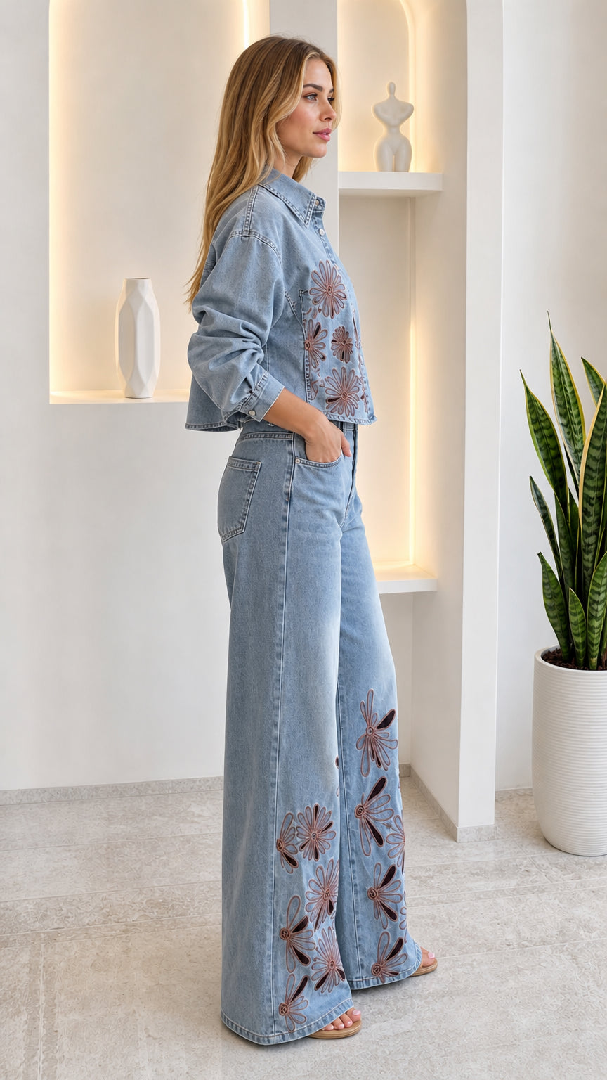 Side profile of woman in light blue floral cutout denim co-ord set