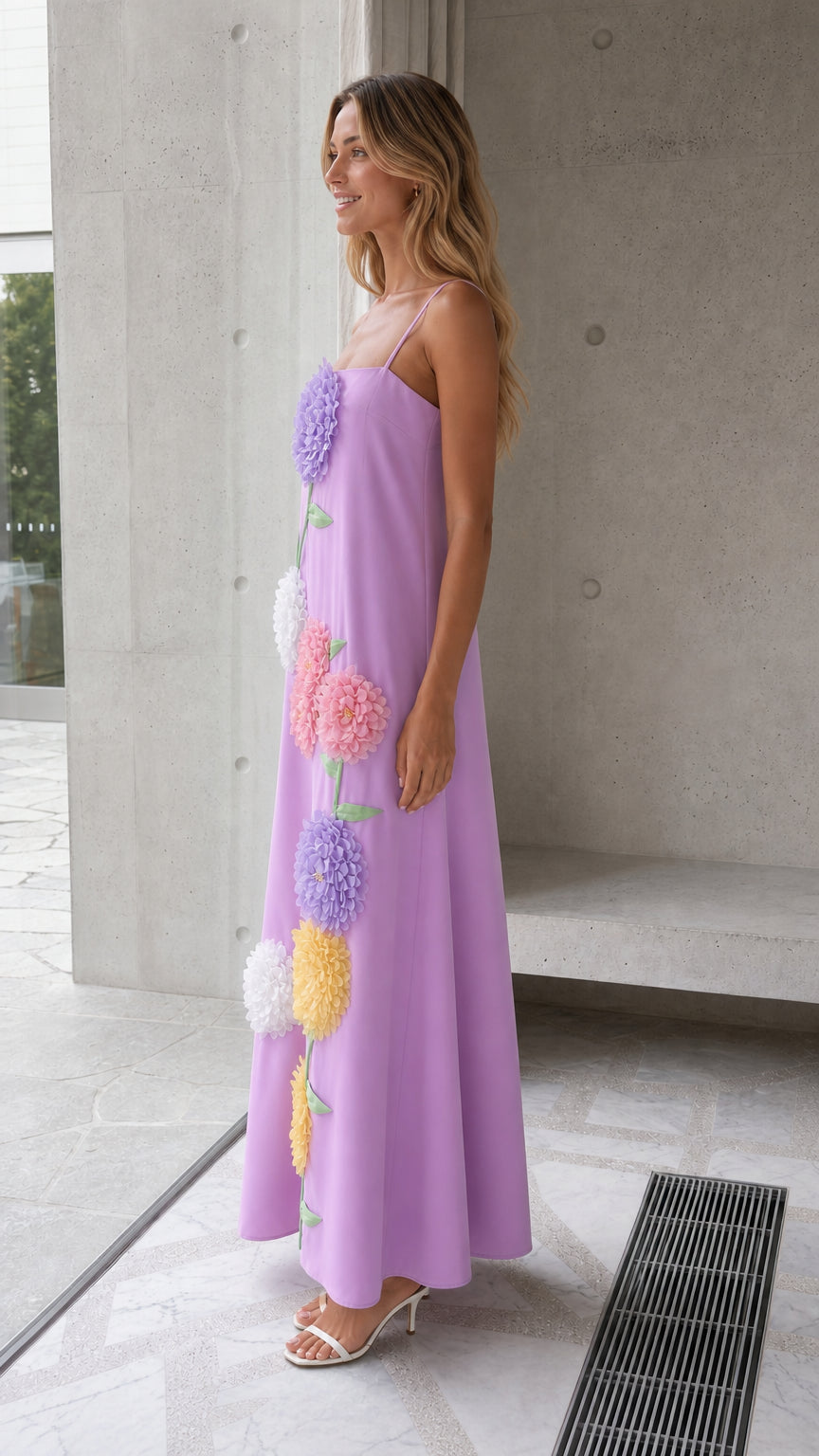 Side profile of model wearing lavender 3D floral appliqué cami dress