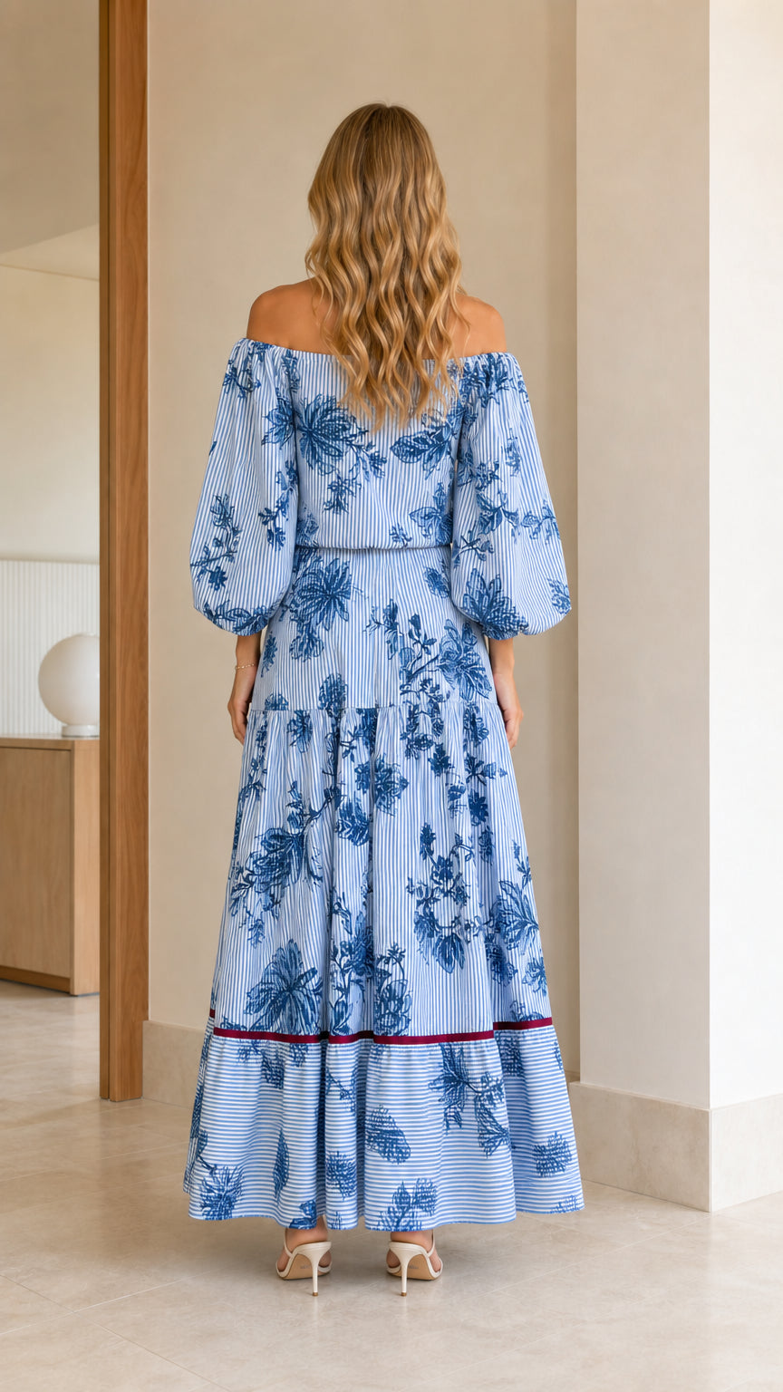 Back view of model in Light Blue off-the-shoulder floral maxi dress
