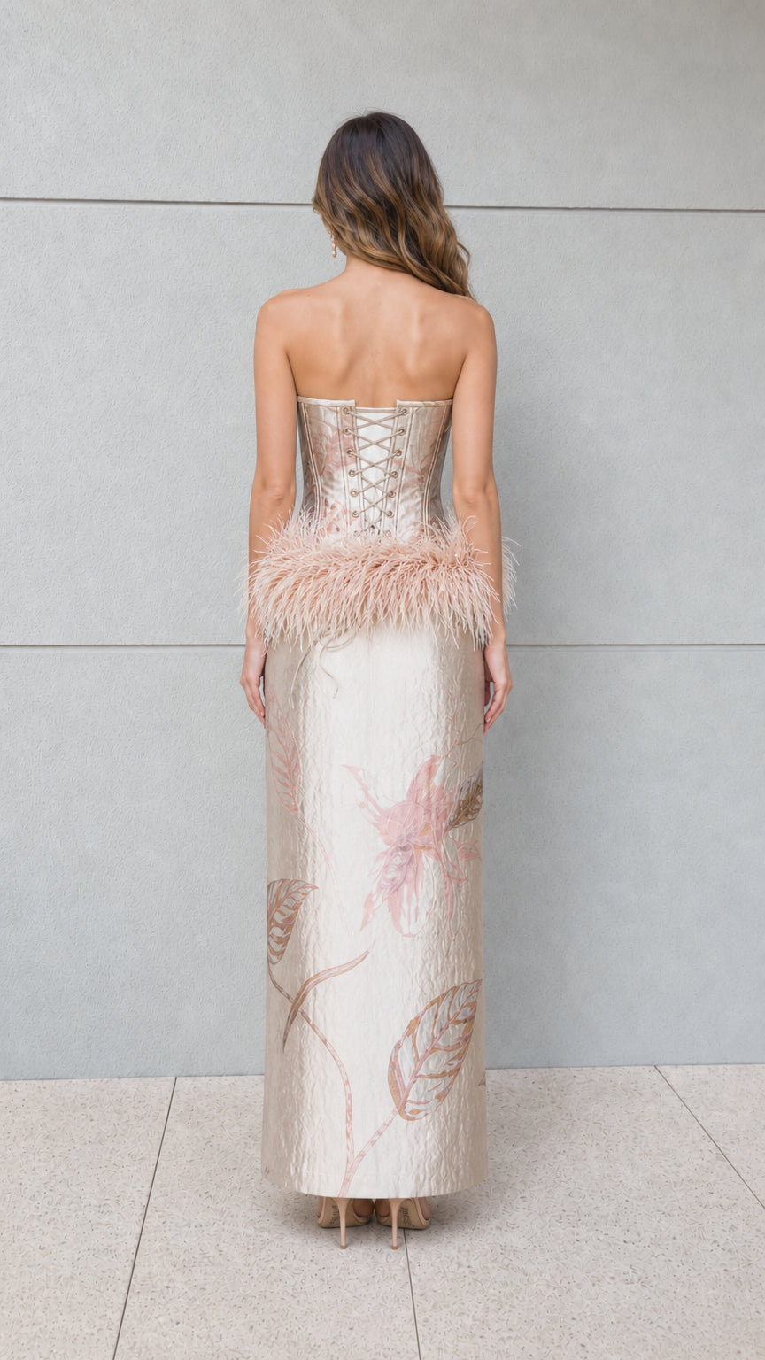 Back view of champagne jacquard maxi dress highlighting lace-up corset detail
