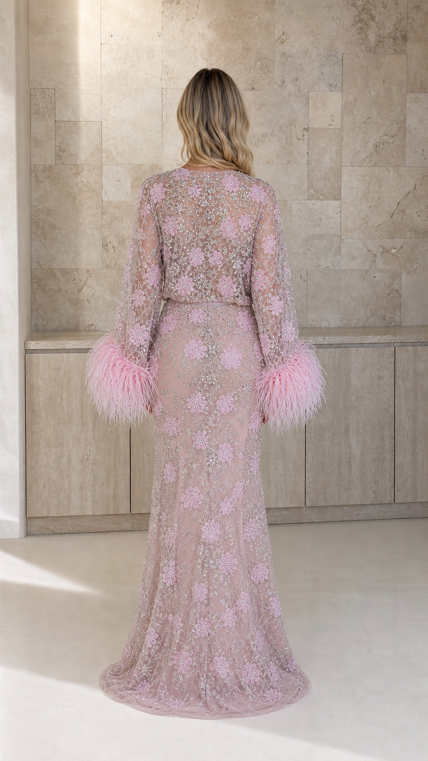 Back view of pink embellished two-piece set showing maxi skirt length
