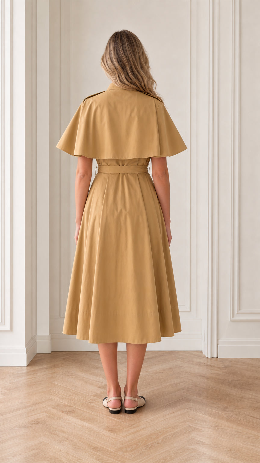 Back view of camel capelet A-line midi dress