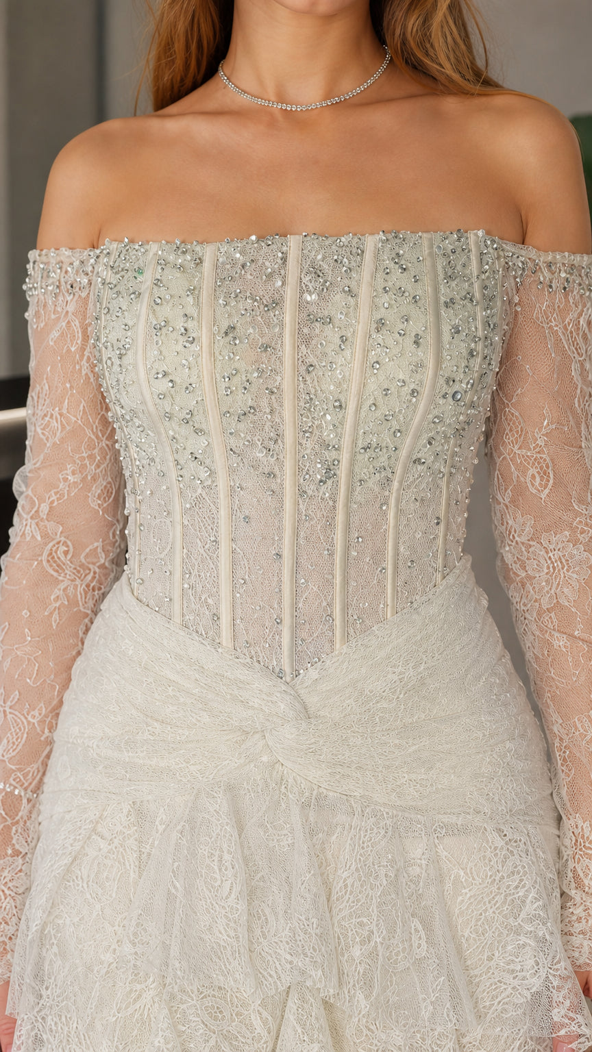 Close-up detail of beaded corset bodice and off-shoulder neckline