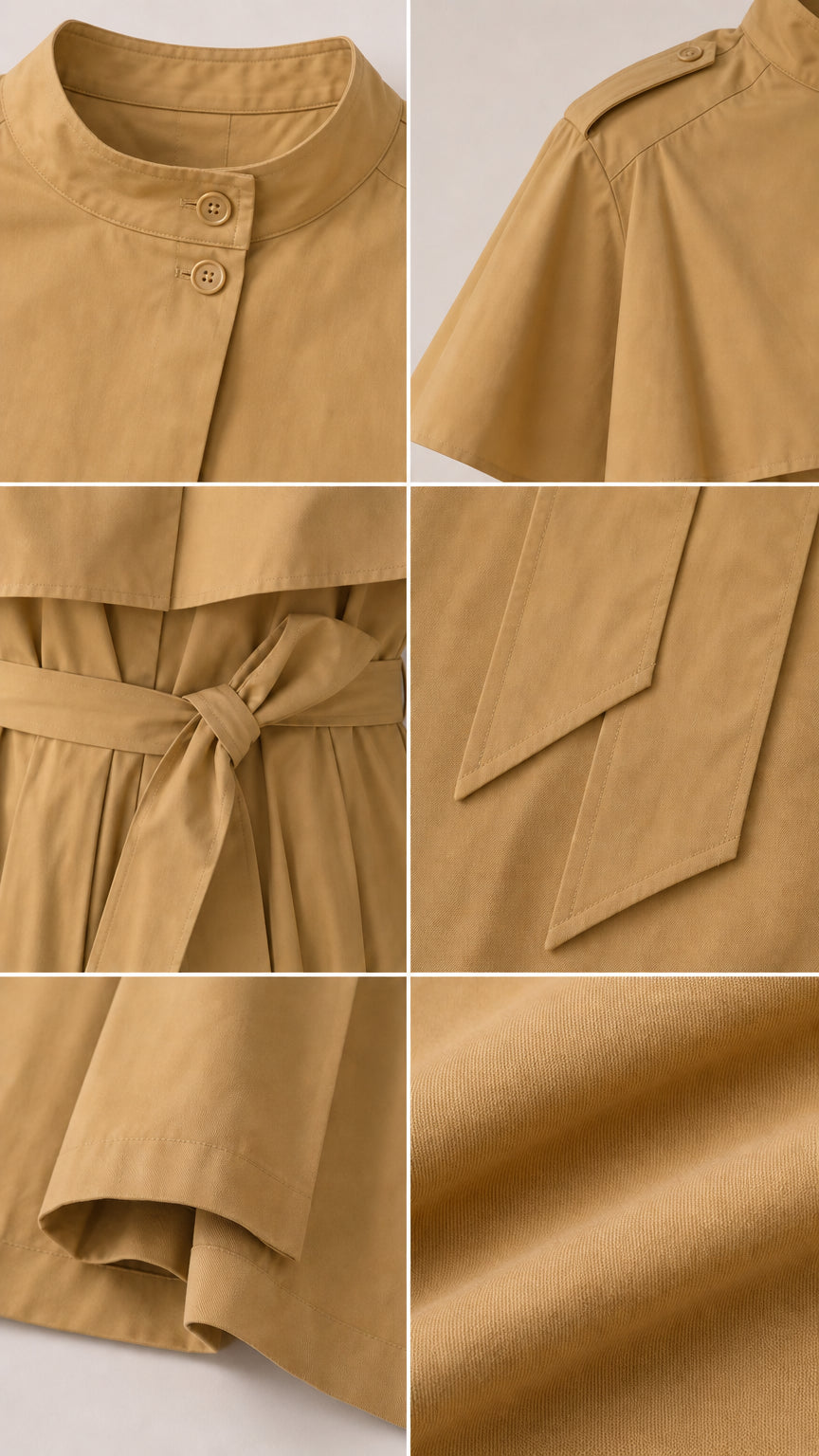 Close-up details of collar, shoulder epaulet, tie belt, and hem stitching on camel dress