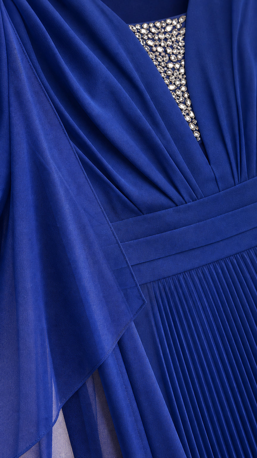 Close-up of rhinestone embellished V-neckline and pleats on royal blue evening dress