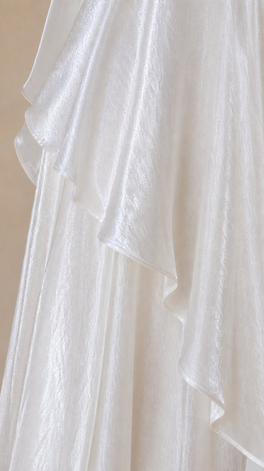 Close-up detail of shimmering tiered ruffle fabric