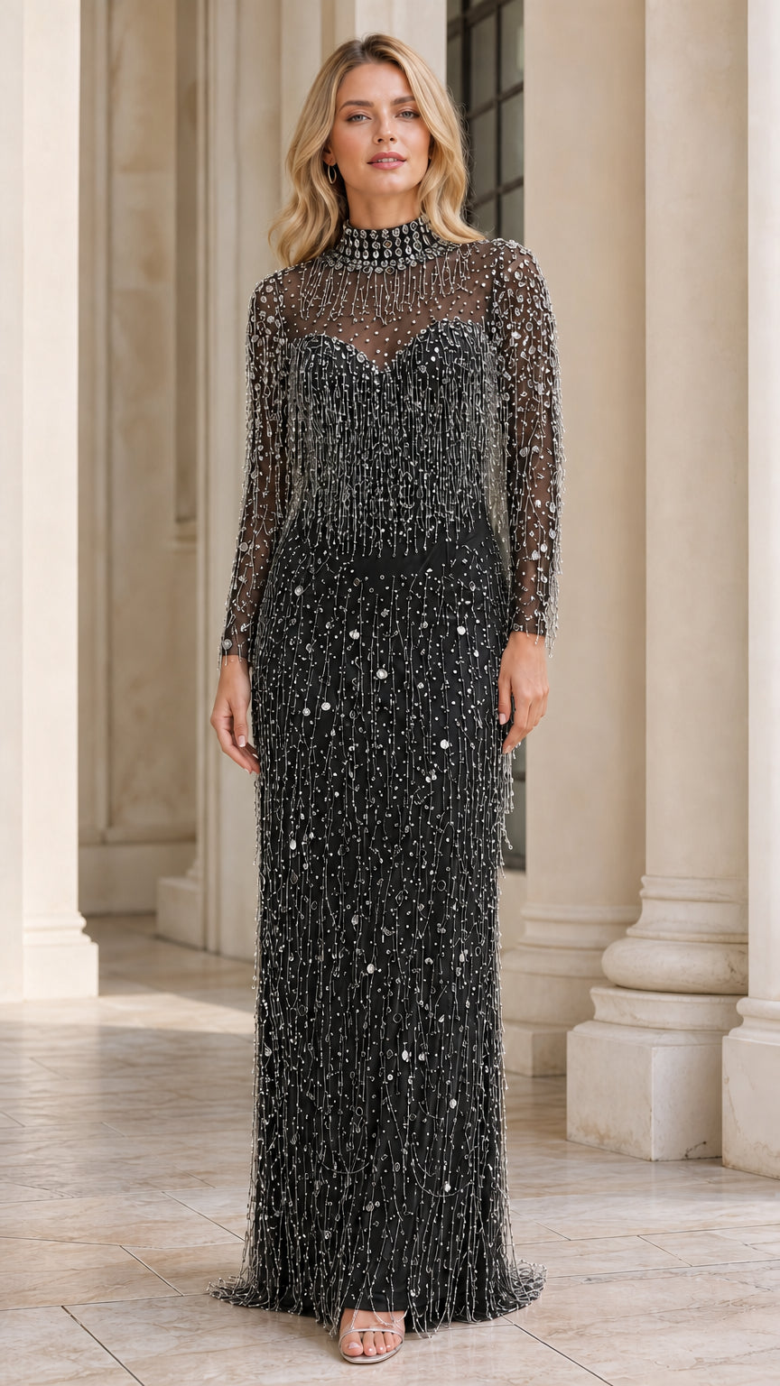 Model wearing black beaded long sleeve evening gown