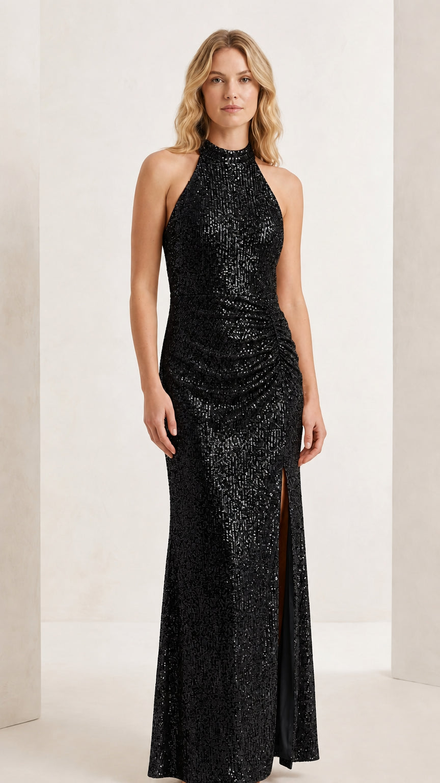 Front full-length view of model wearing the classic black halter sequin evening maxi gown