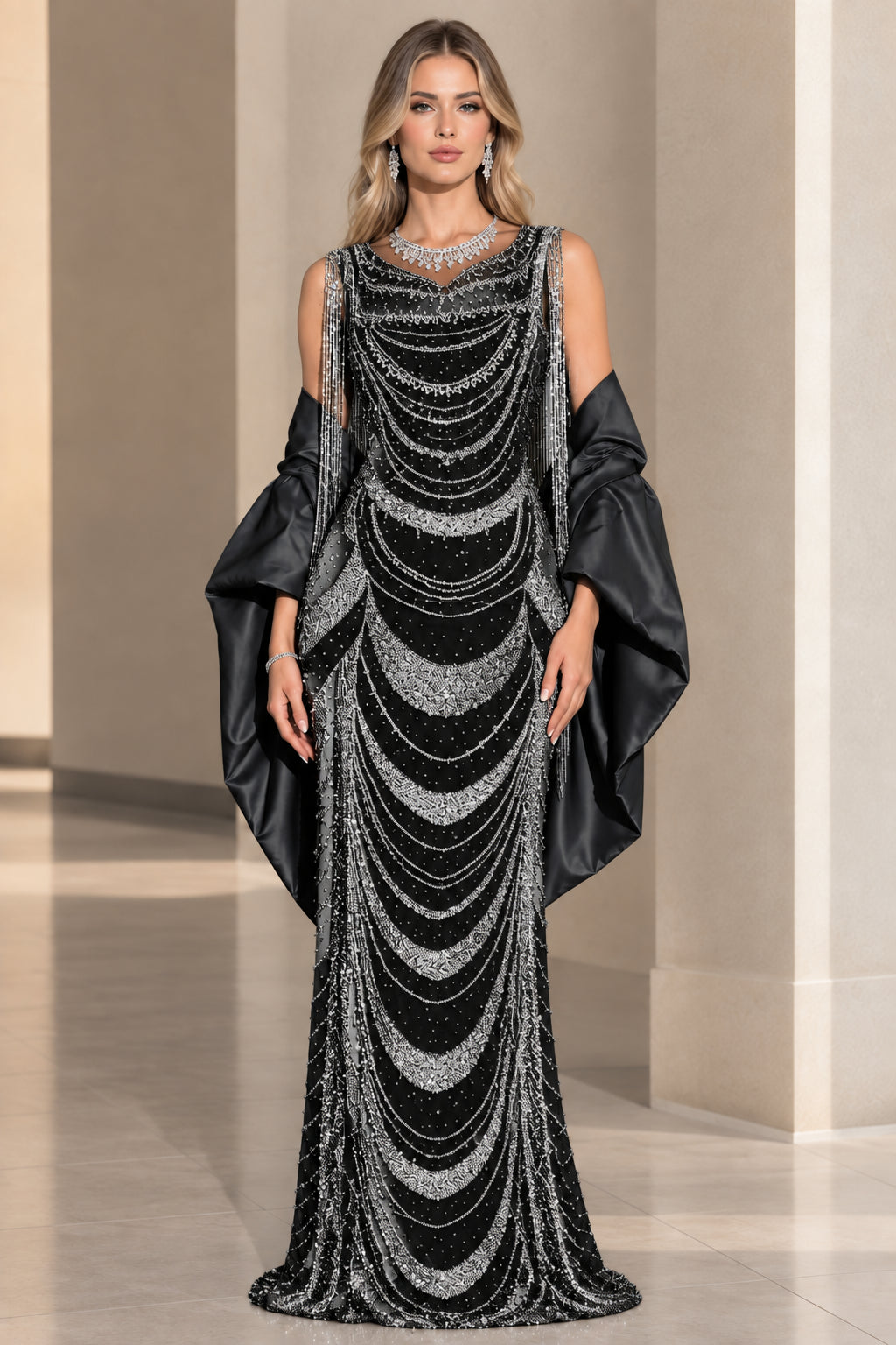 Front view of black scalloped beaded evening gown with black shawl