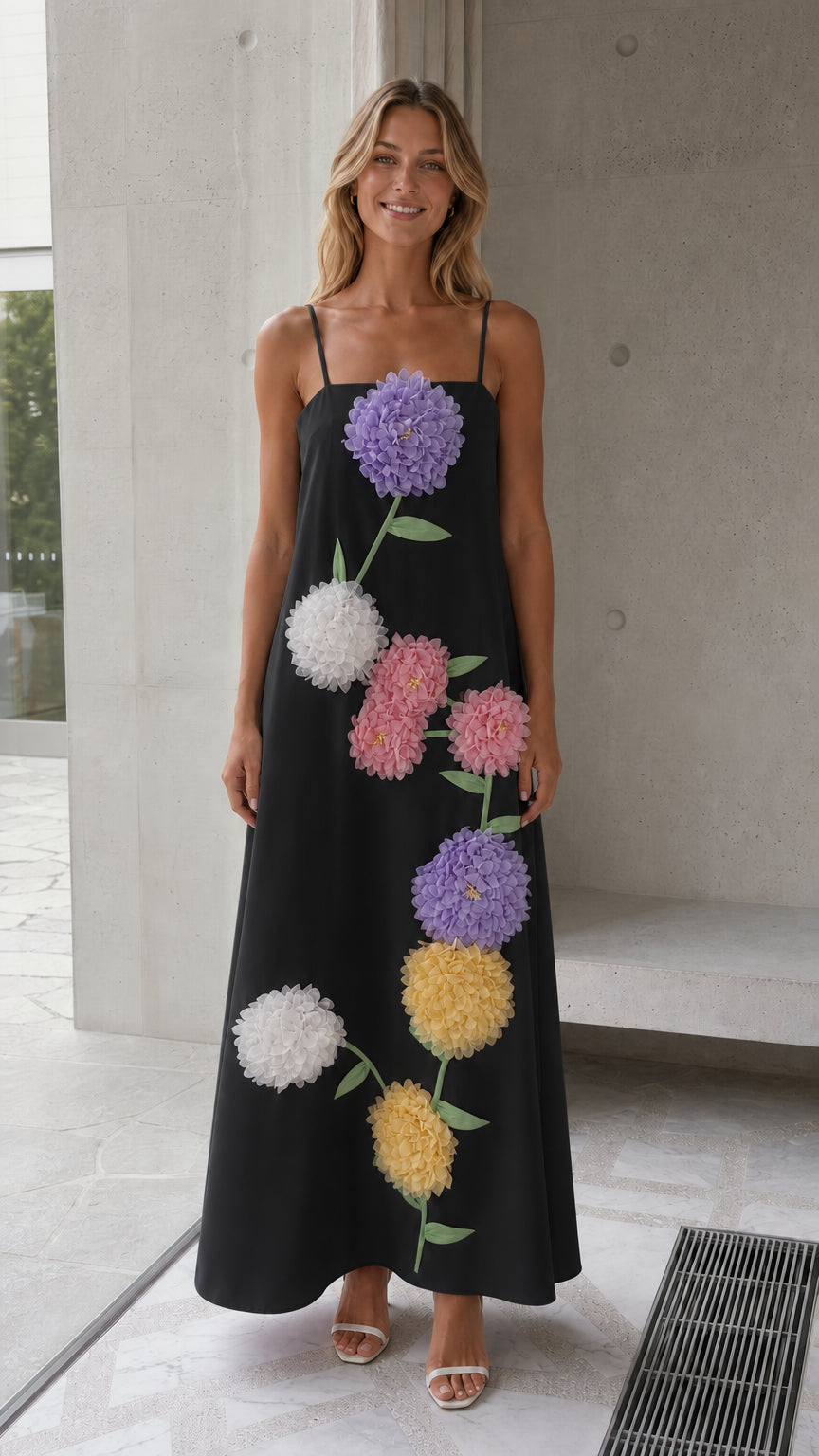 Black spaghetti strap maxi dress with colorful 3D floral detailing