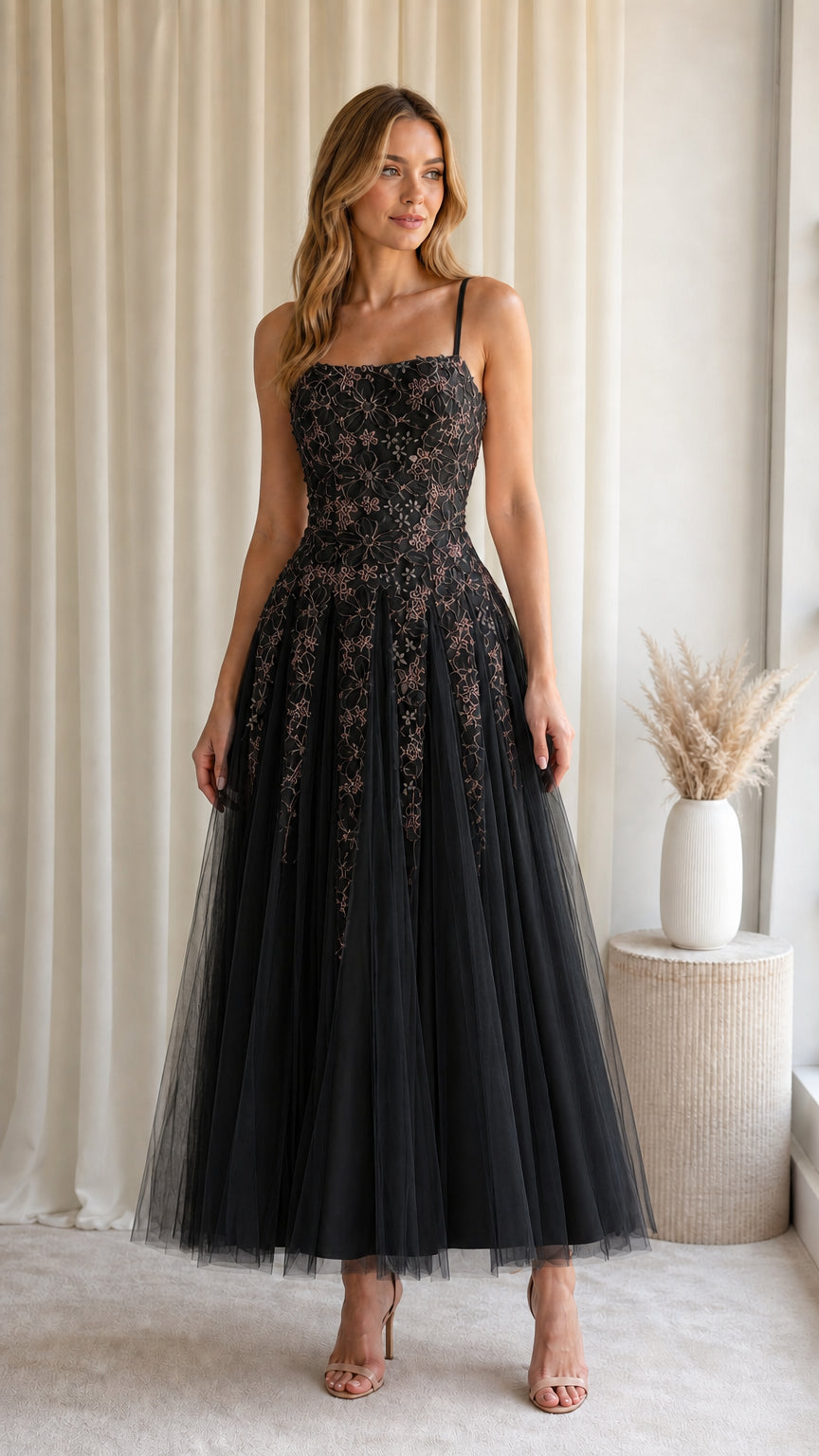 Front view of model wearing Black floral embroidered tulle midi evening dress