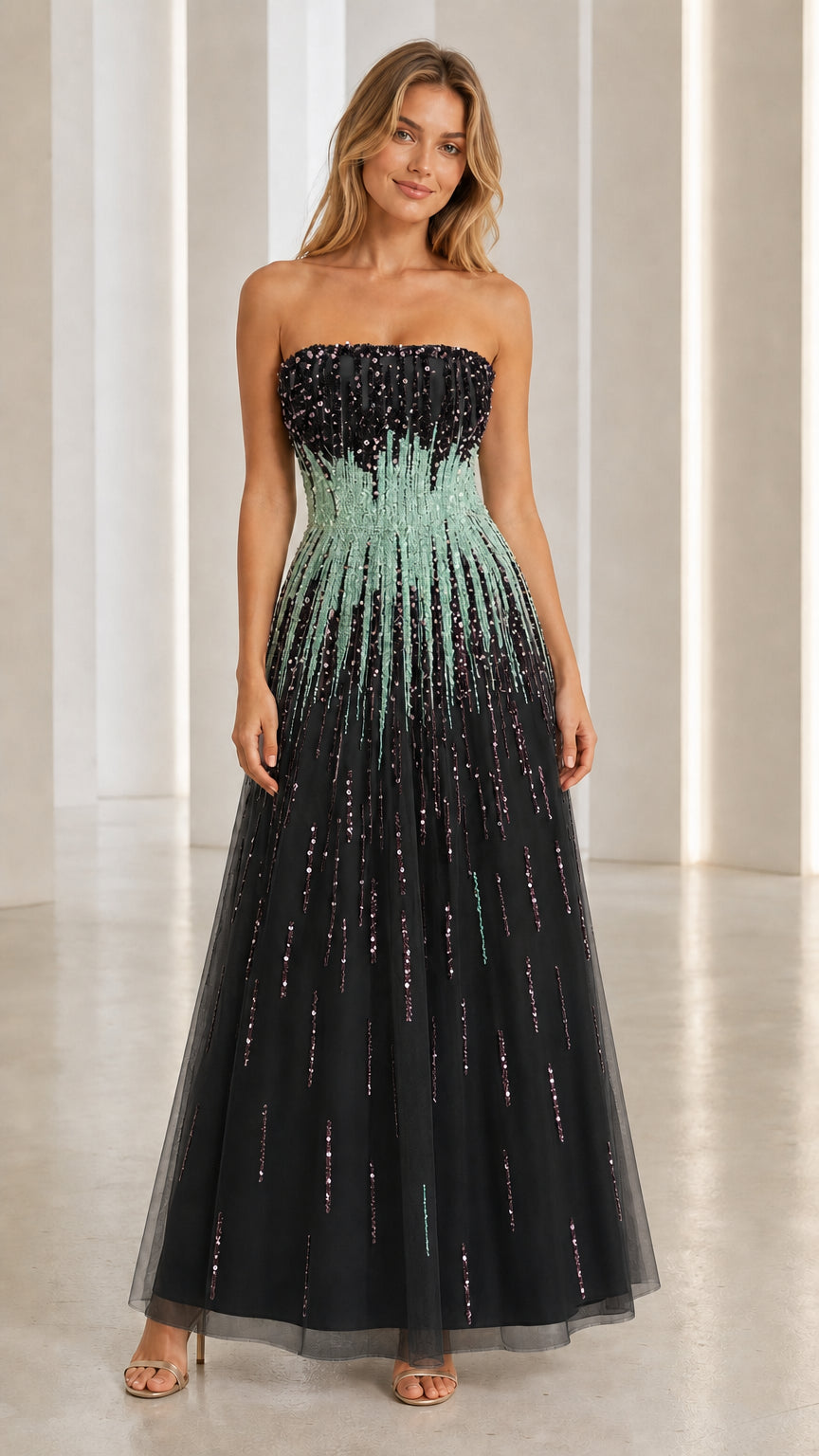 Model wearing black sequin strapless evening gown