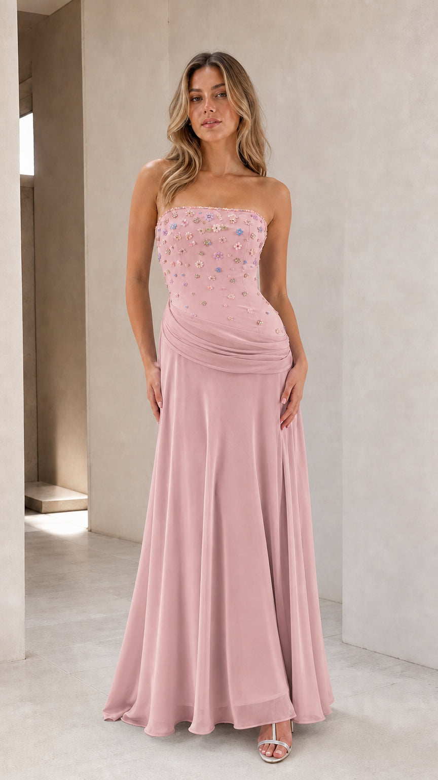 Full-length view of dusty pink strapless floral beaded evening gown