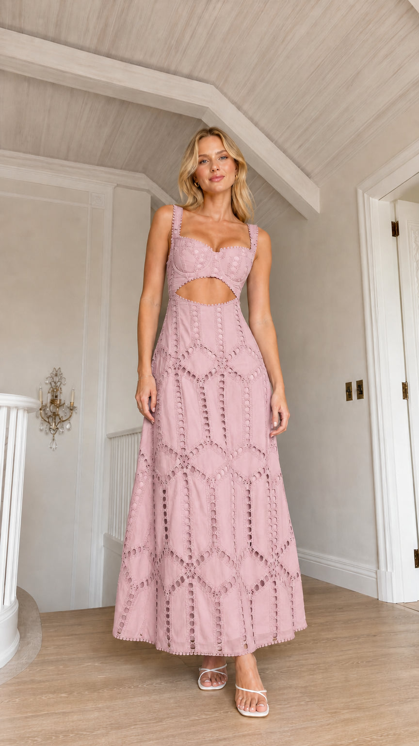 Front view of model wearing pink cutout eyelet maxi dress