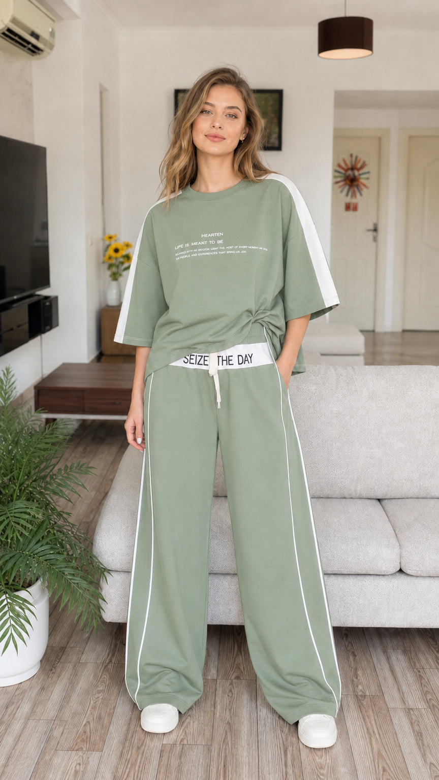 Full front view of model wearing sage green two-piece loungewear set