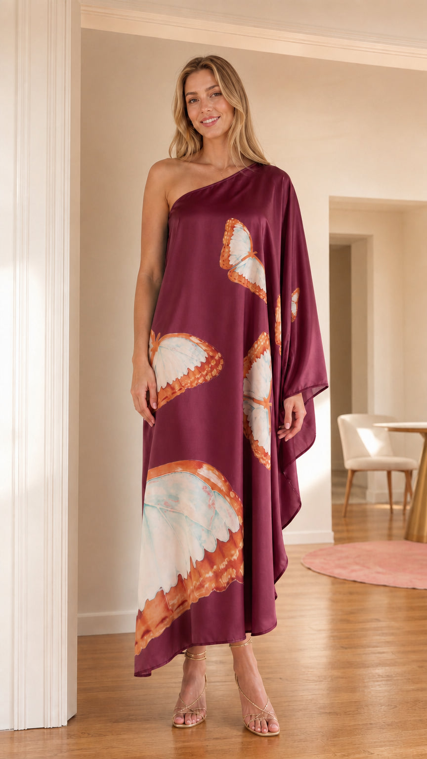 Front view of model wearing Burgundy one-shoulder butterfly print satin kaftan maxi dress
