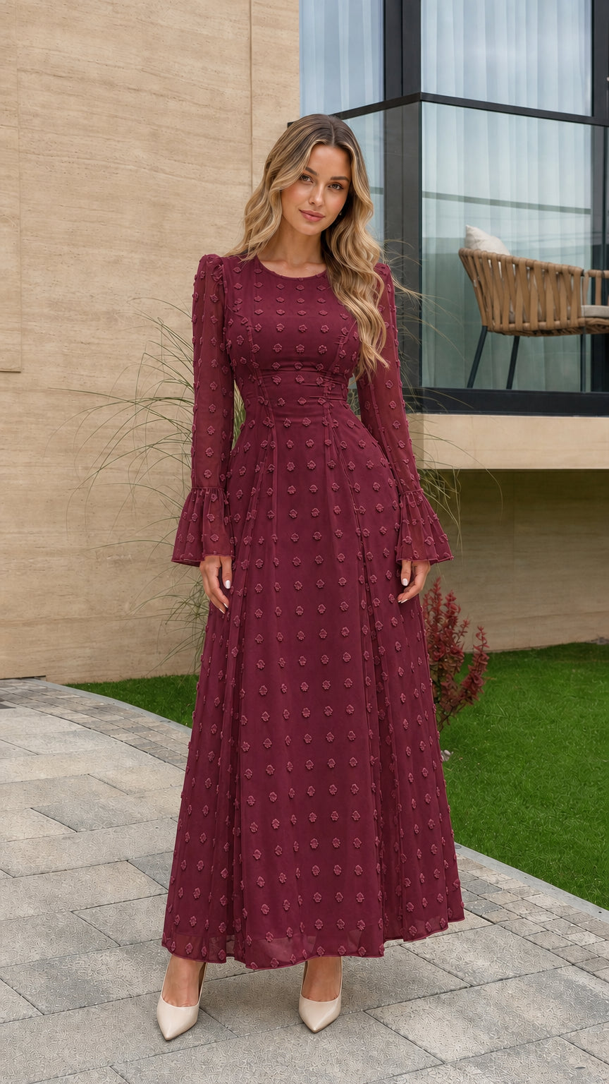Front view of burgundy red Swiss dot long sleeve formal maxi dress