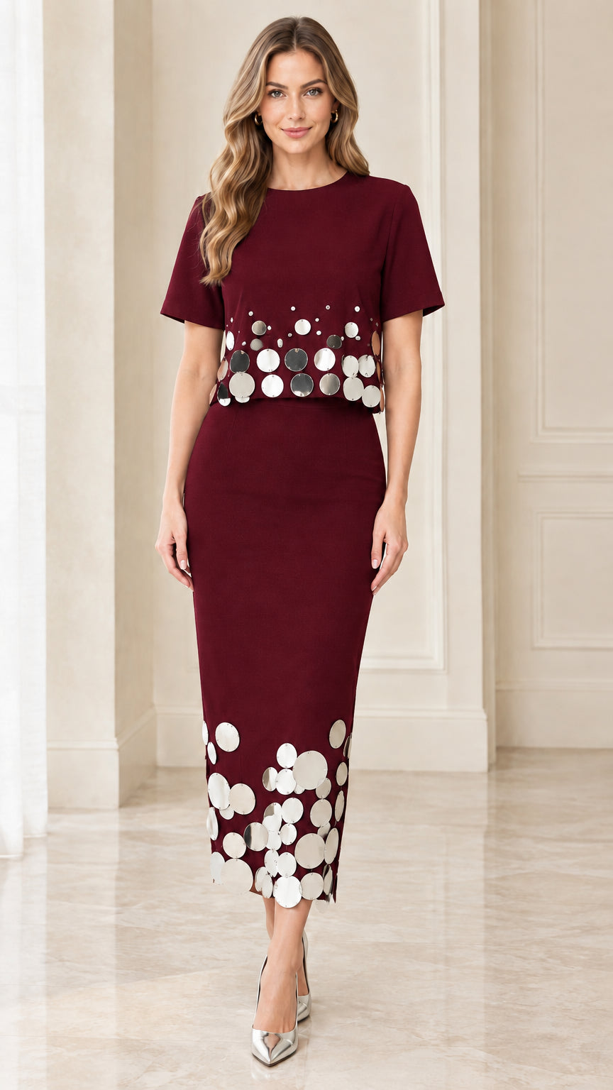 Front view of burgundy short-sleeve midi dress with shiny disc accents