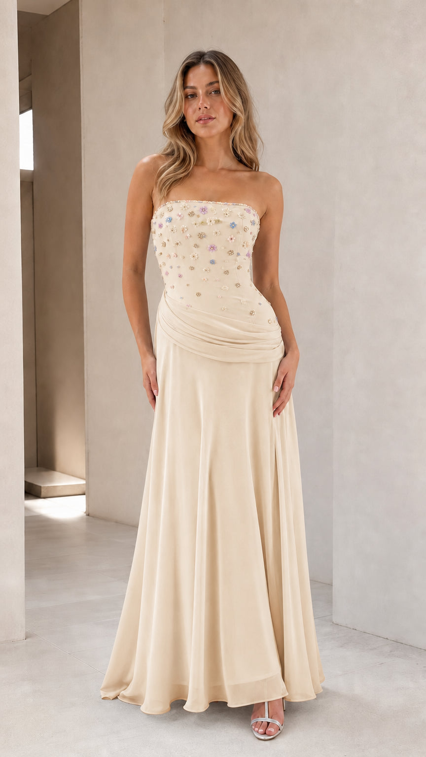 Full-length view of champagne strapless floral beaded evening gown